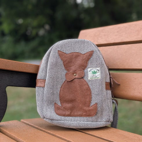 Hemp bag with a cat design on a wooden bench outdoors