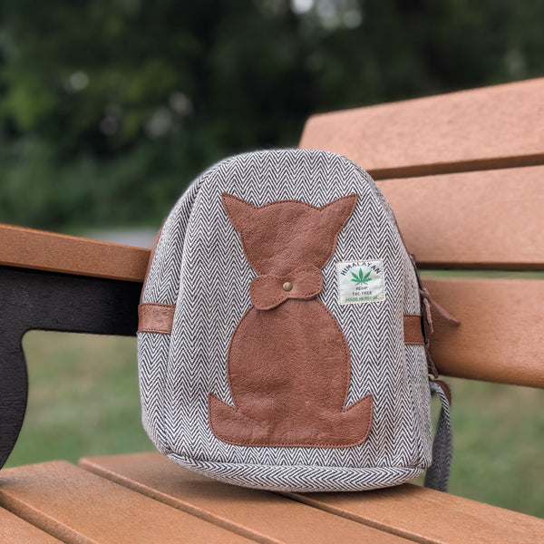 Hemp bag with a cat design on a wooden bench outdoors