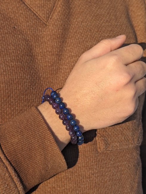 A Man Wearing Amethyst Bracelet And Lapis Lazuli Bracelet