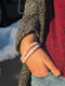 A Woman Wearing Moonstone Bracelet