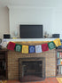 Hanging Rinpochhe Prayer Flag On Fireplace