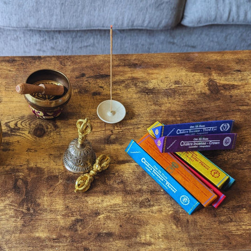 anitque tibetan bell, singing bowl and incense